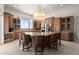 Open kitchen with decorative island, pendant lights, and modern appliances at 3310 John Anderson Dr, Ormond Beach, FL 32176