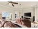 Cozy living room with leather seating and water view at 3310 John Anderson Dr, Ormond Beach, FL 32176