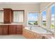 Main bathroom with tub and beautiful water view at 3310 John Anderson Dr, Ormond Beach, FL 32176