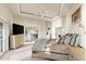 Sunny main bedroom featuring water views and balcony access at 3310 John Anderson Dr, Ormond Beach, FL 32176