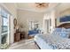 Bright main bedroom with water views and an adjacent seating area with comfortable furniture at 3310 John Anderson Dr, Ormond Beach, FL 32176