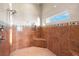 Walk-in shower with tile surround at 3310 John Anderson Dr, Ormond Beach, FL 32176