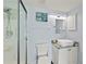 Bathroom features a walk-in shower and a square vessel sink atop a granite counter at 3425 S Atlantic Ave # 1206, Daytona Beach Shores, FL 32118