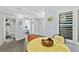 Inviting dining area with bright natural light, featuring access to a well-appointed bathroom and comfortable bedroom at 3425 S Atlantic Ave # 1206, Daytona Beach Shores, FL 32118