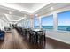 Enjoy dining with a view in this large dining room, featuring expansive windows overlooking the ocean at 3425 S Atlantic Ave # 1206, Daytona Beach Shores, FL 32118