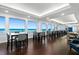 Enjoy dining with a view in this large dining room, featuring expansive windows overlooking the ocean at 3425 S Atlantic Ave # 1206, Daytona Beach Shores, FL 32118