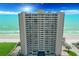 A tall oceanfront condominium building with multiple floors and balconies at 3425 S Atlantic Ave # 1206, Daytona Beach Shores, FL 32118