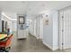 Elegant hallway with tile flooring, seamlessly connecting the kitchen, living area, and bedrooms for easy flow at 3425 S Atlantic Ave # 1206, Daytona Beach Shores, FL 32118