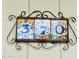 Close-up of the decorative and colorful tile house number '370' at 370 S Center St, Ormond Beach, FL 32174