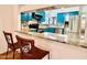 View of the kitchen featuring stainless steel appliances and bar seating at 370 S Center St, Ormond Beach, FL 32174