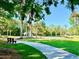 Scenic park with well-maintained pathways, benches, and lush green spaces for relaxation at 370 S Center St, Ormond Beach, FL 32174