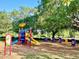A colorful playground awaits in a serene, park-like setting, ready for joyful activities at 370 S Center St, Ormond Beach, FL 32174