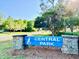 View of Central Park sign with well-maintained landscaping and trees at 370 S Center St, Ormond Beach, FL 32174