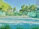 Fenced tennis court offering a great recreational amenity for residents at 370 S Center St, Ormond Beach, FL 32174