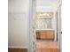 Bathroom featuring floral wallpaper, a vanity, a sink, and a walk-in shower at 405 Secluded Oaks Trl, Deland, FL 32724