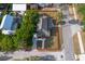 An aerial view of the property showcasing the home, yard, and surrounding neighborhood at 415 W Church St, Deland, FL 32720