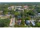 Aerial view of a home with mature trees in a walkable neighborhood close to downtown at 415 W Church St, Deland, FL 32720