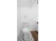 Clean bathroom featuring a new toilet, tiled floor, and vanity with shower to the left at 415 W Church St, Deland, FL 32720