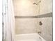 Shower featuring decorative tile surround at 421 Hope Ter, Maitland, FL 32751