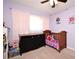 Bedroom featuring neutral paint, natural light, and hardwood floors at 421 Hope Ter, Maitland, FL 32751
