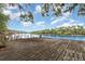 Long wooden dock with weathered planks and view of the river at 4293 Cypress Bnd, Geneva, FL 32732