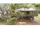 Waterfront home with a detached gazebo and stairs down to the water at 4293 Cypress Bnd, Geneva, FL 32732