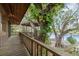 Wooden deck with water view, leading to a gazebo near the waterfront at 4293 Cypress Bnd, Geneva, FL 32732