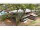 Exterior view of a waterfront home with a metal roof at 4293 Cypress Bnd, Geneva, FL 32732