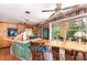 Spacious kitchen and dining area featuring wood cabinets and a large stainless steel refrigerator at 4293 Cypress Bnd, Geneva, FL 32732