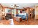 Relaxing living room featuring a recliner, couch and bright light from the large windows at 4293 Cypress Bnd, Geneva, FL 32732