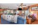 Open living space with a mix of kitchen and living areas, accented with wood walls at 4293 Cypress Bnd, Geneva, FL 32732