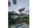 Exterior view of a building with landscaping and a ramp to the entrance at 4401 Sea Mist Dr # 201, New Smyrna Beach, FL 32169