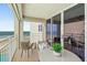 Relax on this private balcony featuring ocean views and comfortable seating at 4505 S Atlantic Ave # 505, Ponce Inlet, FL 32127