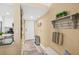 Welcoming entryway with beachy décor and convenient coat rack at 4505 S Atlantic Ave # 505, Ponce Inlet, FL 32127