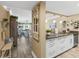 Stylish open-concept kitchen with modern appliances, open to living area at 4505 S Atlantic Ave # 505, Ponce Inlet, FL 32127