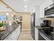 Updated kitchen with stainless steel appliances and granite countertops at 4505 S Atlantic Ave # 505, Ponce Inlet, FL 32127