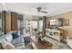 Inviting living room with an ocean view balcony, media center, and comfortable seating at 4505 S Atlantic Ave # 505, Ponce Inlet, FL 32127