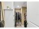Walk-in closet with custom shelving and an organized space for storage at 4505 S Atlantic Ave # 505, Ponce Inlet, FL 32127