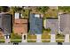 Aerial view of the house with a large backyard, neighboring homes, and a street with parked cars at 4534 Bond Ln, Oviedo, FL 32765
