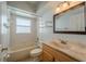 Bathroom with a tub and a single sink vanity at 4534 Bond Ln, Oviedo, FL 32765