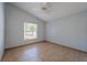 Bedroom with a ceiling fan and a window at 4534 Bond Ln, Oviedo, FL 32765