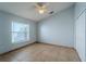 Bedroom with a ceiling fan and a window at 4534 Bond Ln, Oviedo, FL 32765