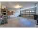 Spacious garage featuring an automatic door opener and ample room for storage at 4534 Bond Ln, Oviedo, FL 32765