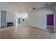 Open floor plan showcasing the living room with fireplace and tile flooring at 4534 Bond Ln, Oviedo, FL 32765
