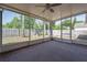 Relaxing screened patio showcasing views of the lush green backyard at 4534 Bond Ln, Oviedo, FL 32765