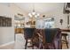 View of the wet bar with the kitchen and pool in the background at 481 W Holly Dr, Orange City, FL 32763