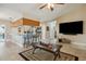 Bright, open floor plan with breakfast bar and kitchen nearby at 481 W Holly Dr, Orange City, FL 32763