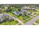 Spacious home with well-maintained landscaping, mature palms, and inviting curb appeal in desirable neighborhood at 483 N Pine Meadow Dr, Debary, FL 32713