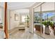 Main bedroom with a sitting area and sliding glass doors leading to a private pool area at 483 N Pine Meadow Dr, Debary, FL 32713