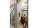 Stylish wine cellar featuring wrought iron gates, a barrel rack, and ample storage for wine bottles at 483 N Pine Meadow Dr, Debary, FL 32713